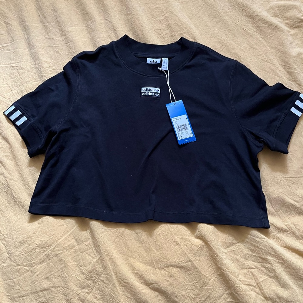Cropped adidas athletic tee.